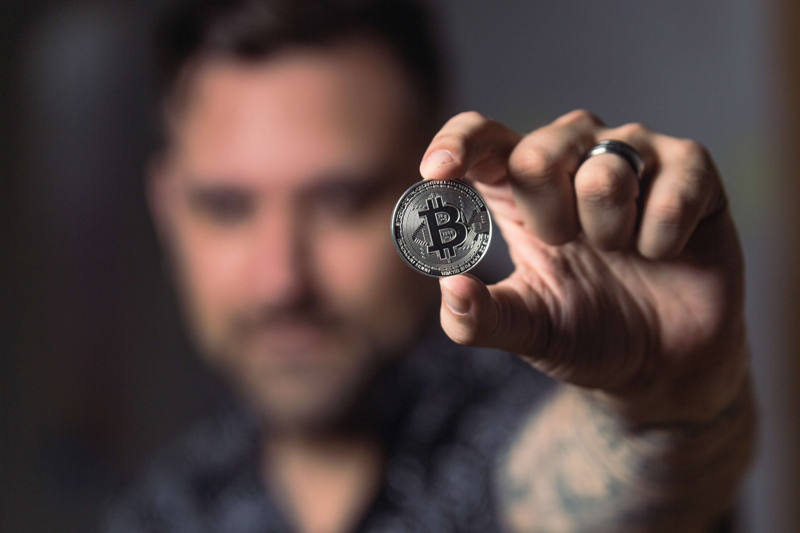 Man holding a coin